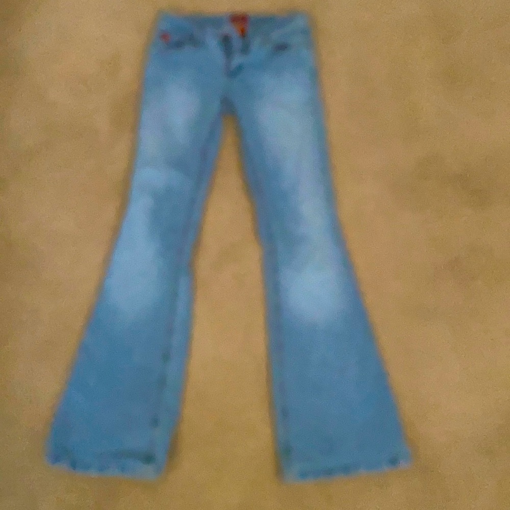 pair of brand new tilt jeans with all the labels
